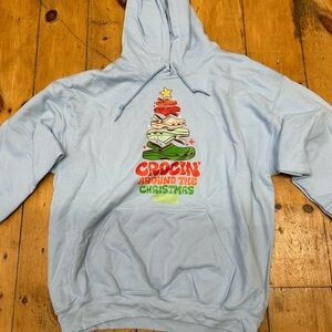 Gildan Light Blue Christmas Graphic Sweater
Croc’in around the Christmas tree